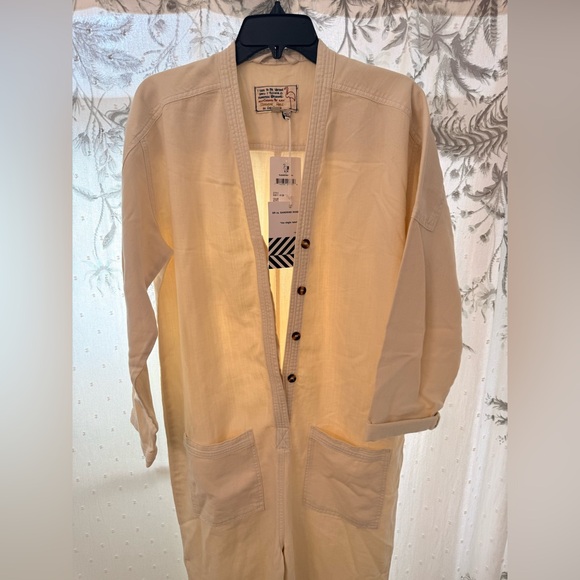 Elegant Cream Button-Front Jumpsuit - Picture 2 of 7